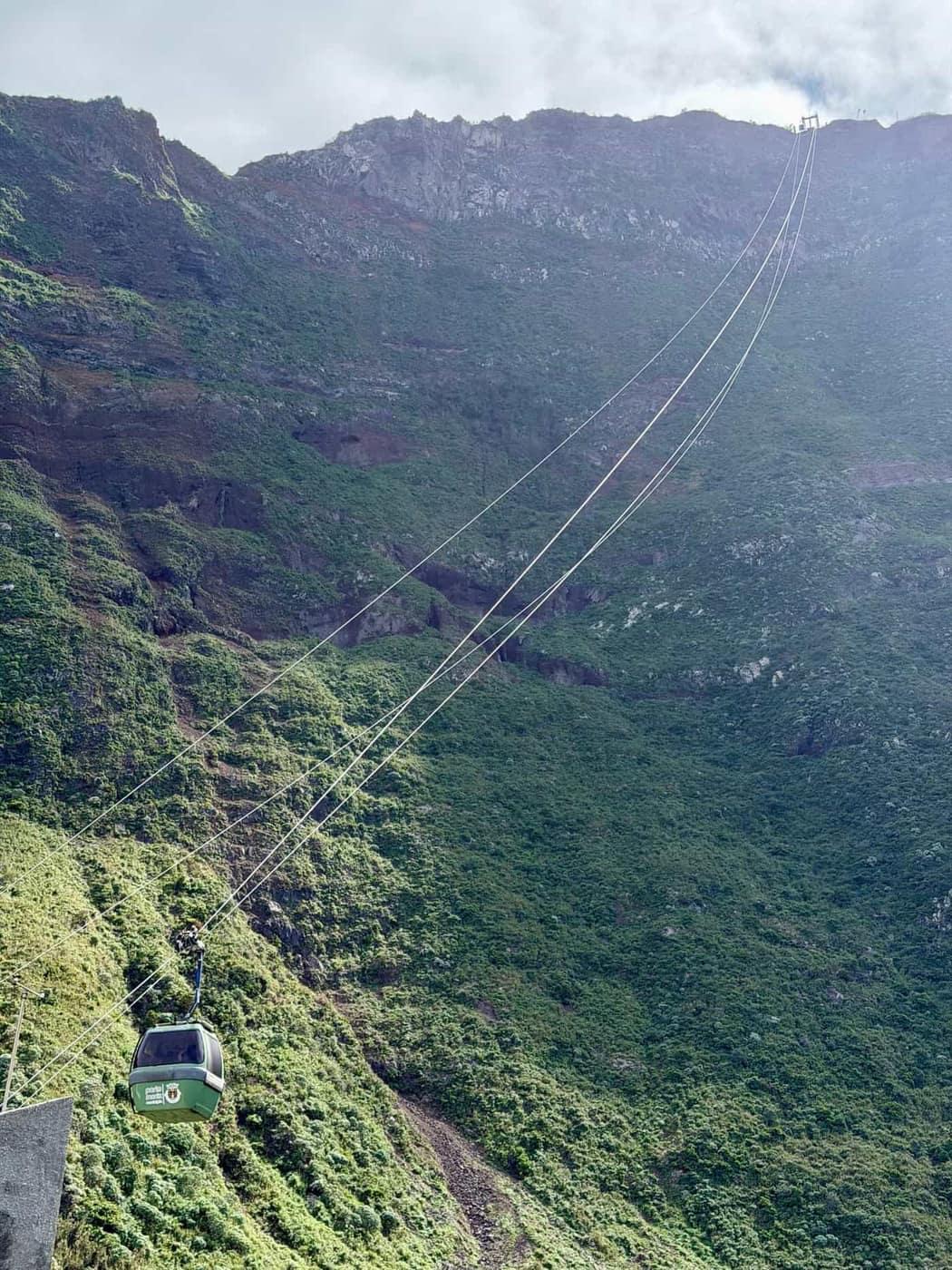 Teleférico cable car descending sea cliffs at Achadas da Cruz, Madeira - view 2