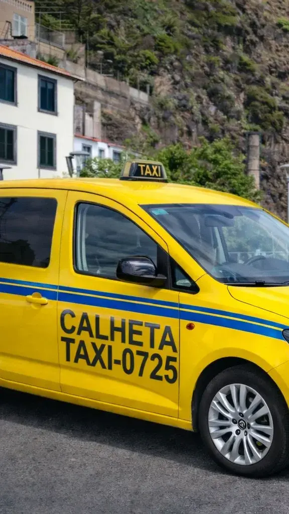 Calheta Taxi - Yellow taxi at Porto Moniz