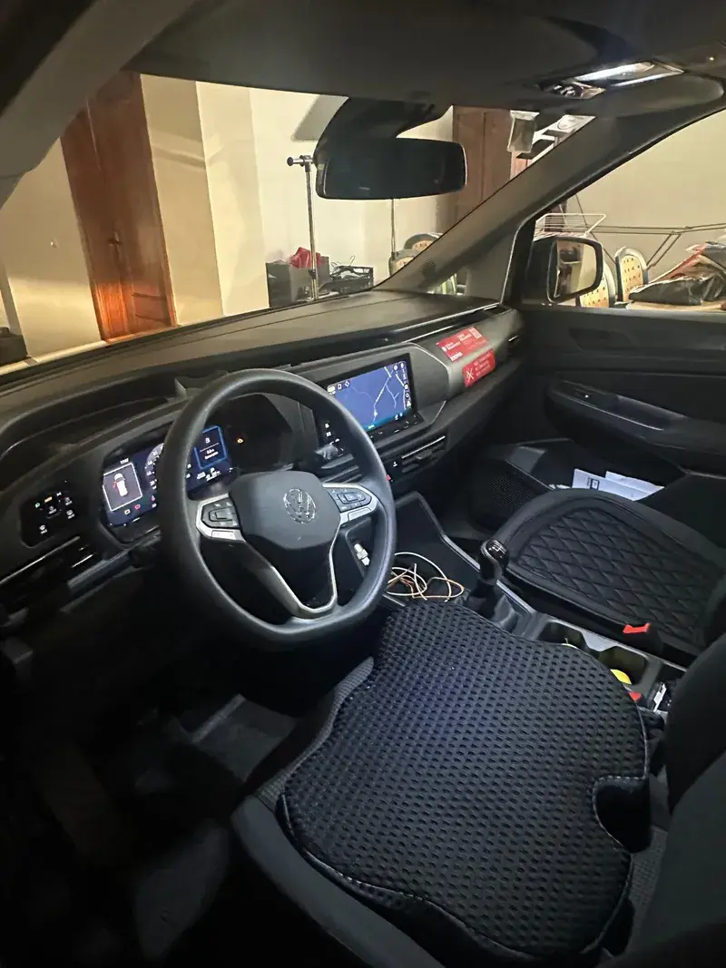 VW Caddy 2025 modern dashboard with digital displays and navigation